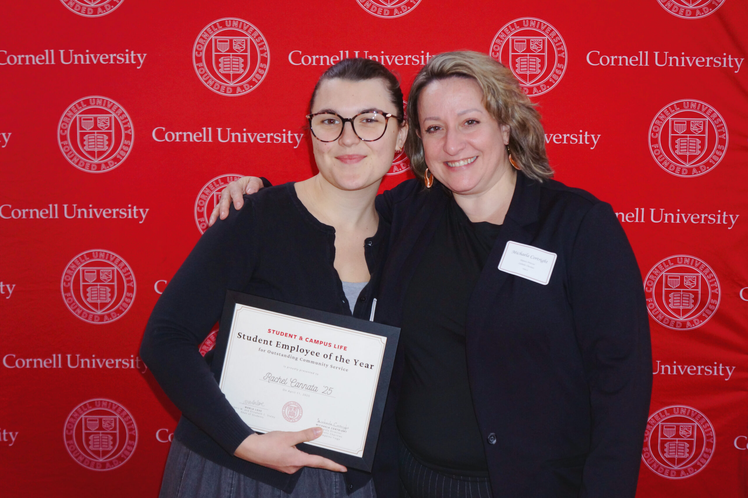 (l) Rachel Cannata ’25, the Student Employee of the Year winner in the Community Service category, with Michaela Cortright, deputy director of Catholic Charities Tompkins/Tioga. photo/Jacob Mroczek